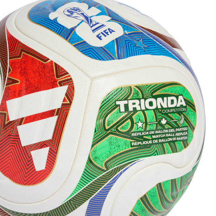 Competition soccer ball close-up showing TRIONDA branding and green/red/blue graphics