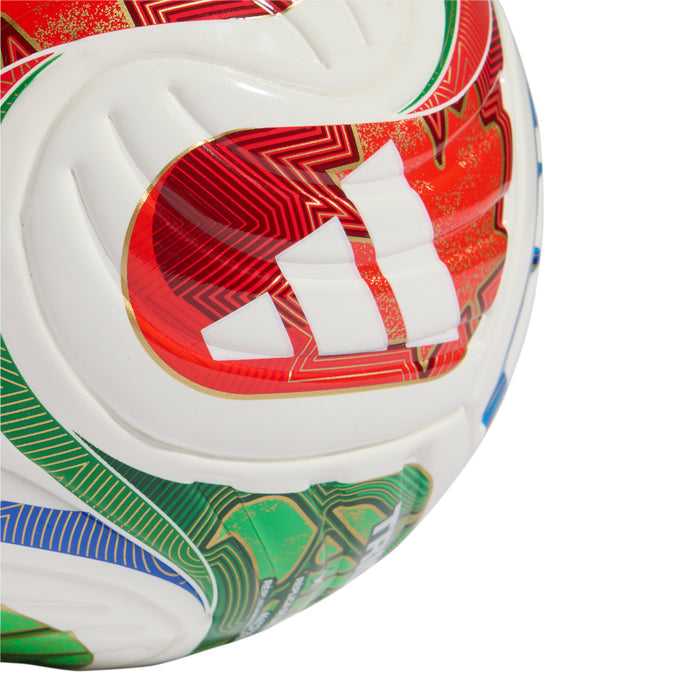 Close-up of mini soccer ball panel with red abstract zigzag pattern and white stripes