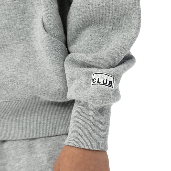 Heather grey hoodie sleeve cuff with 'CLUB' woven logo patch