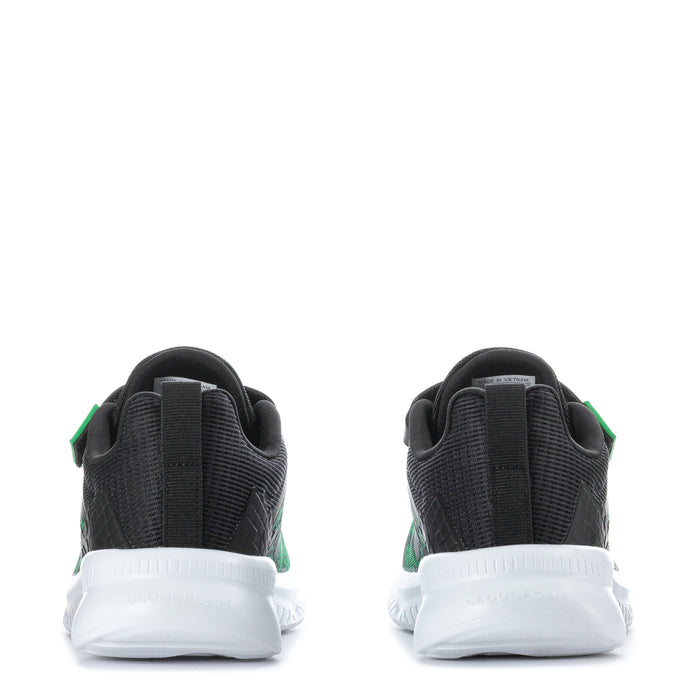 Kids' black sneakers with green heel accents and white cushioned sole
