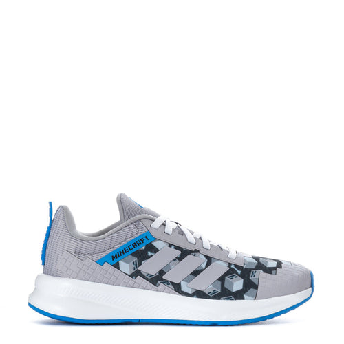 Youth running shoes in light gray knit with Minecraft print, white sole, blue accents.