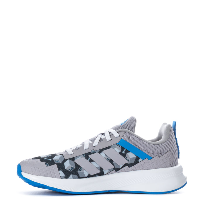 Youth running shoes, gray upper with Minecraft block graphic, blue stripe, white midsole.