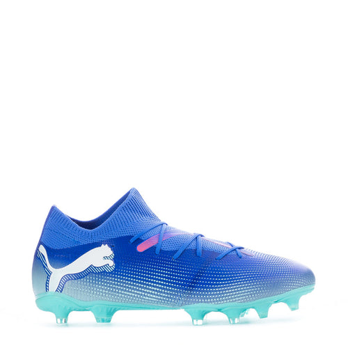 Men's blue soccer cleat with white Puma logo, mint outsole, pink accents
