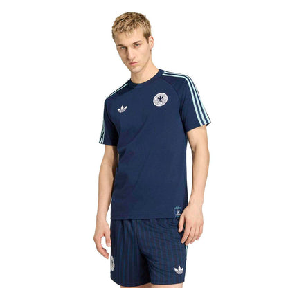 Men's collegiate navy tee with white shoulder stripes and circular crest logo.