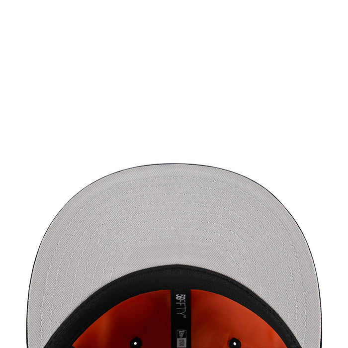 Light gray baseball cap close-up with black inner crown and eyelets