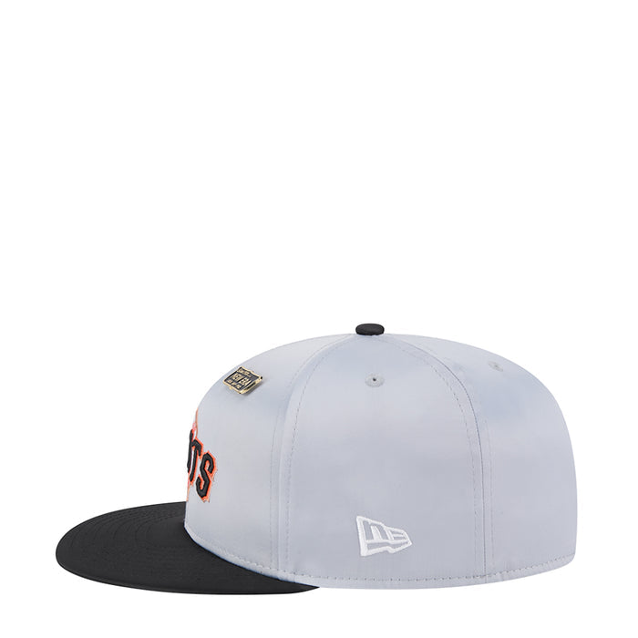 Two-tone light gray baseball cap with orange-and-black side logo and black brim