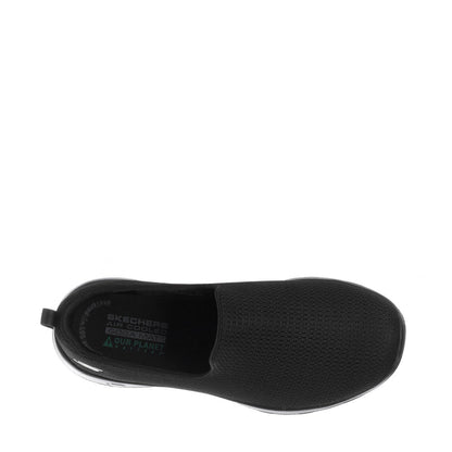 Women's black slip-on walking shoes, interior side view with Skechers branding