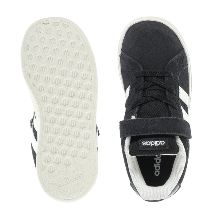 Black toddler sneakers outsole and toe view, white rubber traction sole