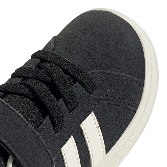Black suede toddler sneaker with textured laces and white stripe detail