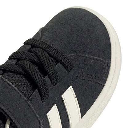 Black suede toddler sneaker with textured laces and white stripe detail