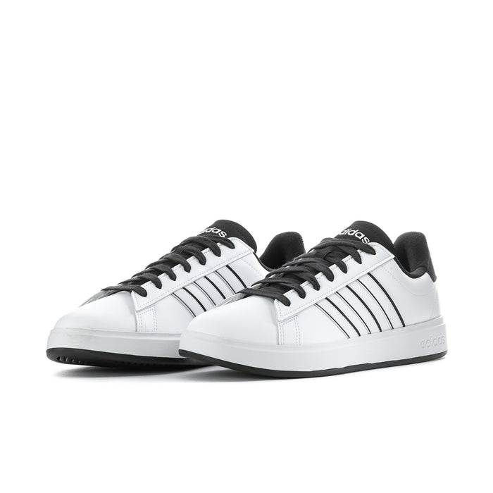 Men's adidas sneakers, white leather-look upper with black stripe detailing.