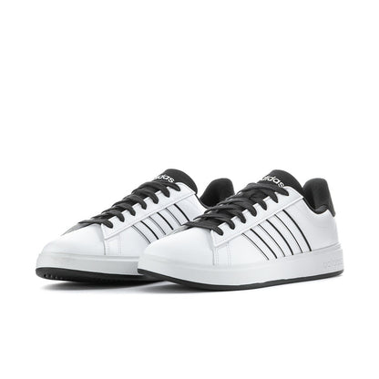 Men's adidas sneakers, white leather-look upper with black stripe detailing.