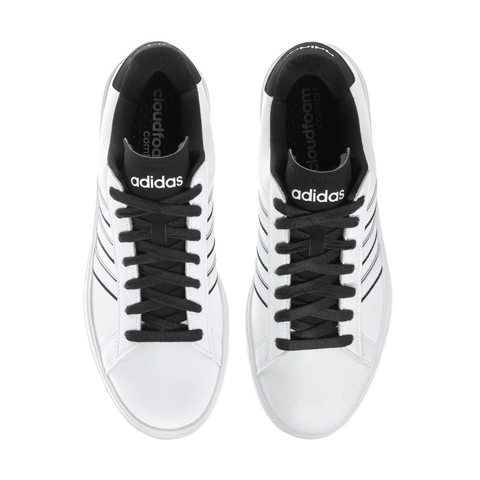 Men's adidas sneakers with black laces and adidas logo on the tongue.