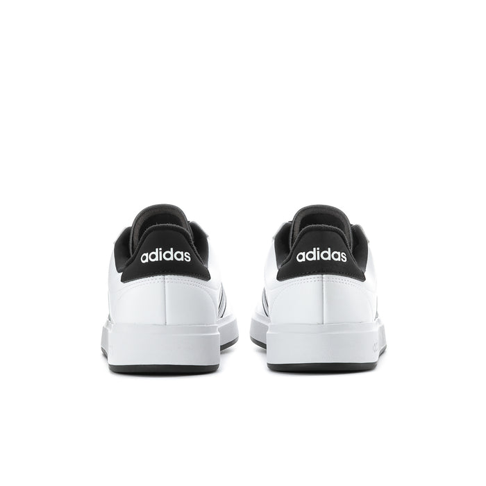 Men's adidas sneakers with white leather-look uppers and black heel tabs.
