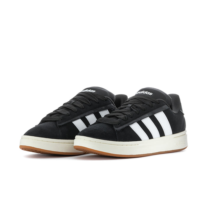 Men's adidas sneakers, black lace-up with white side stripes and gum-brown outsole