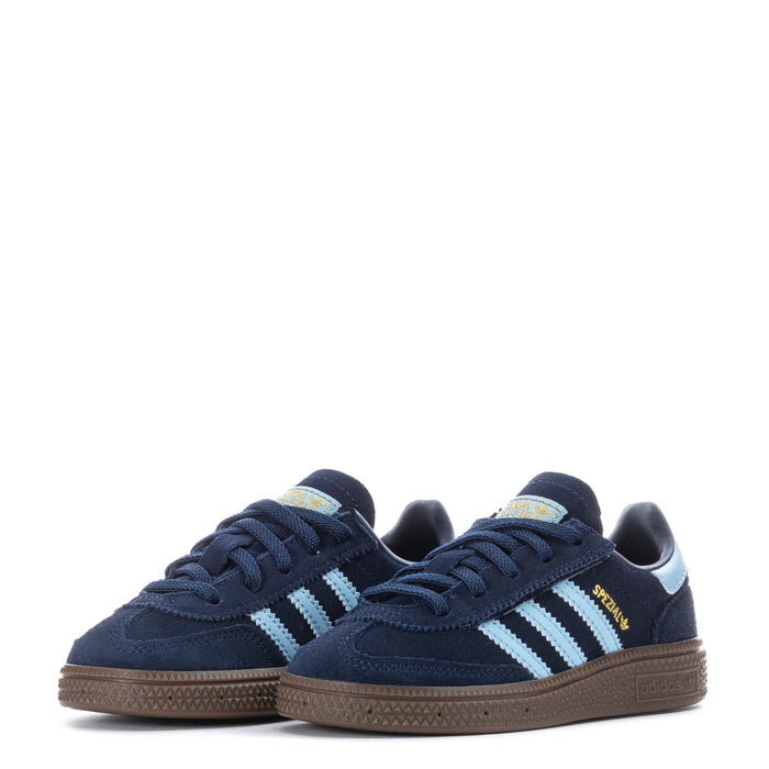 Pair of toddler navy sneakers with light blue stripes and brown gum rubber outsole