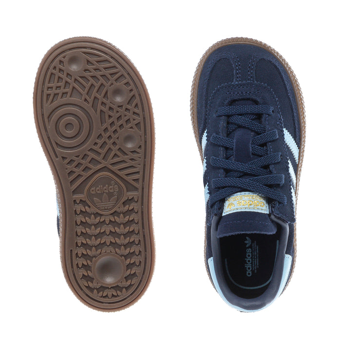 Toddler sneaker soles: brown patterned rubber outsoles with navy upper and laces