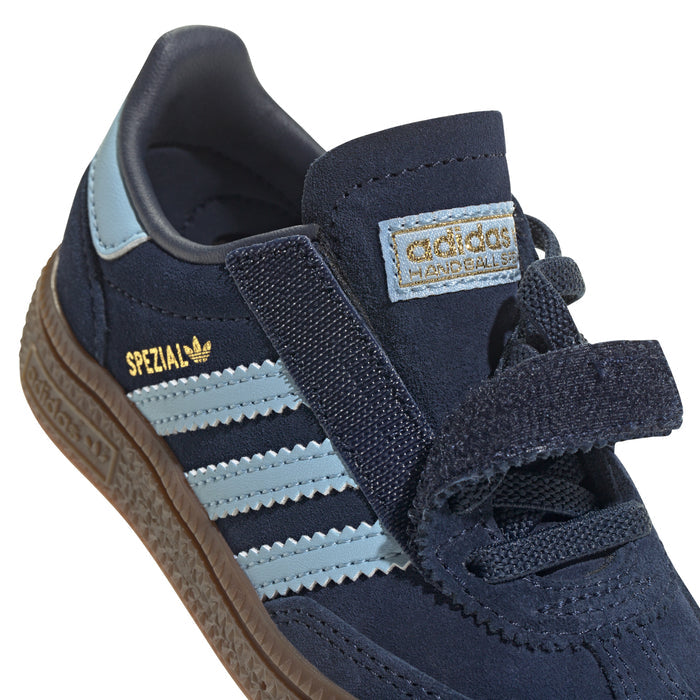 Toddler navy sneakers with hook-and-loop strap, light blue stripes, and adidas Spezial badge