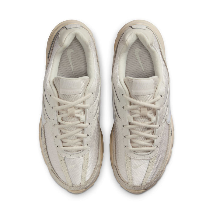Womens sneaker front view, light sail upper with white laces and cushioned collar