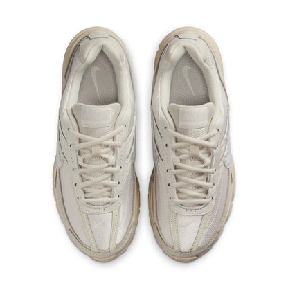 Womens sneaker front view, light sail upper with white laces and cushioned collar