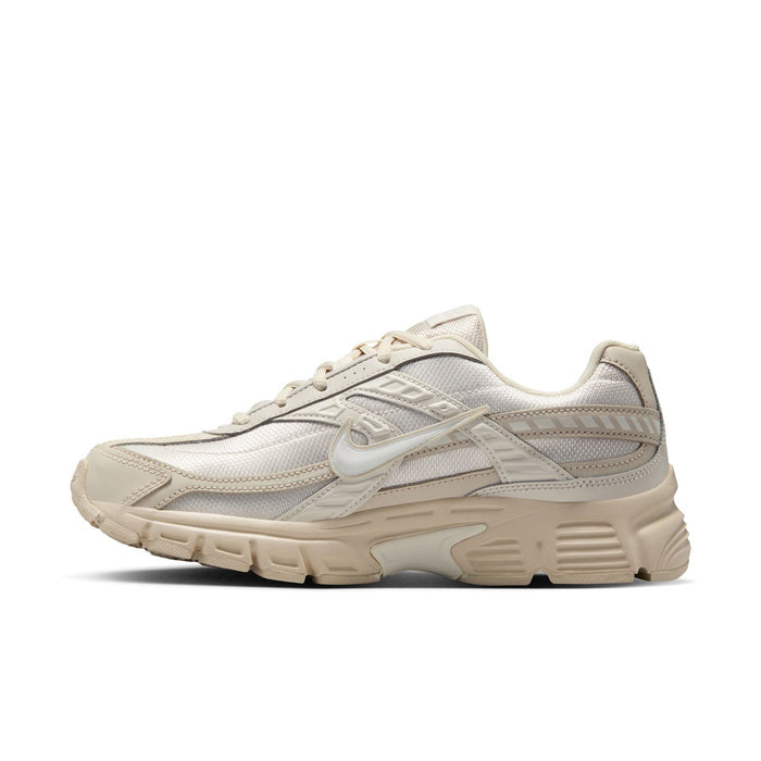 Womens running sneaker side view, light sail upper with swoosh logo and chunky midsole