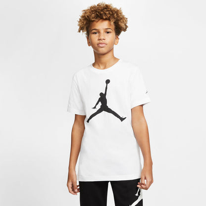 Youth Jumpman graphic T-shirt in white on a model, crew neck, short sleeves