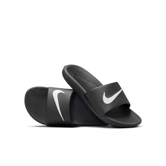Youth black slide sandals with white swoosh logo and textured straps