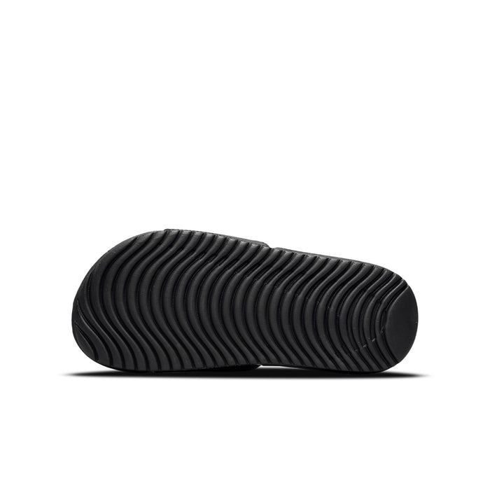 Youth black slide sandal outsole with grooved tread