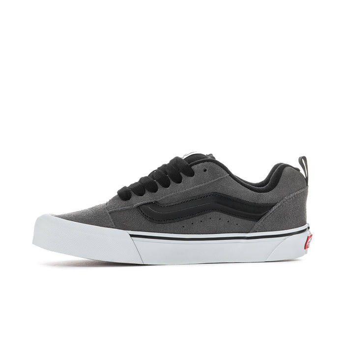 Men's suede sneaker side view in pewter gray with black laces and white platform sole