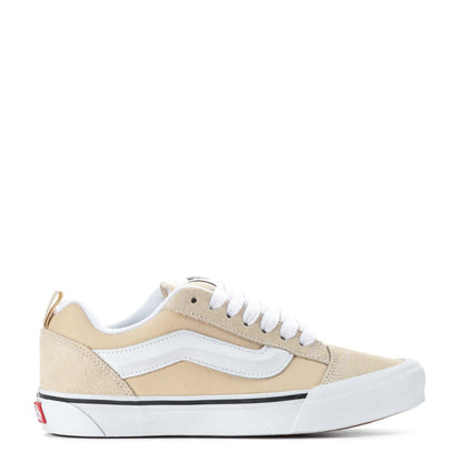 Beige and white low-top women's sneakers with white laces and light blue side stripe