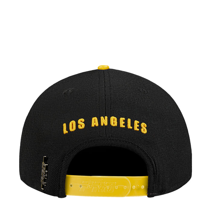 Black snapback baseball cap showing adjustable back strap and yellow Los Angeles text