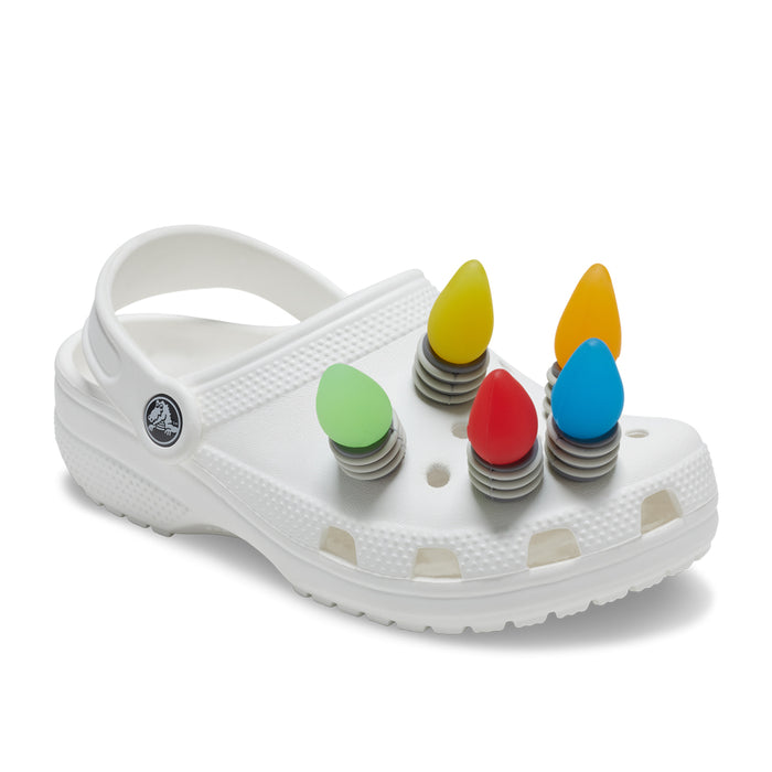 LED holiday lights Jibbitz charms on white clogs: red, blue, green, yellow