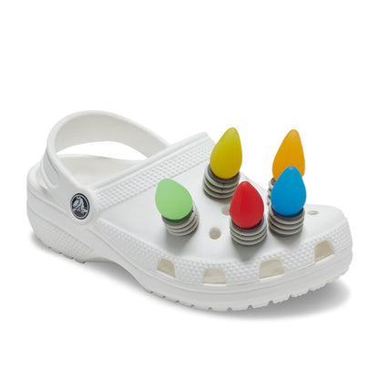 LED holiday lights Jibbitz charms on white clogs: red, blue, green, yellow