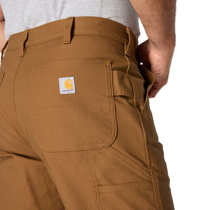 Men's Carhartt brown duck dungaree pants with front pockets and logo patch