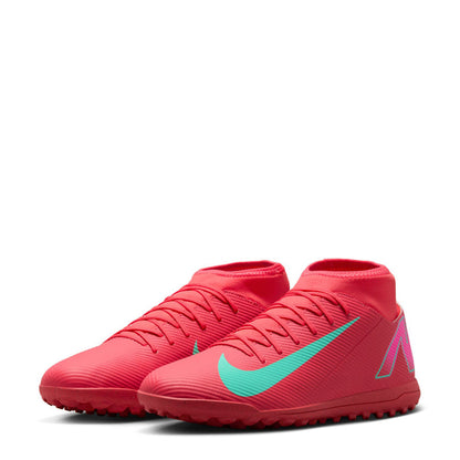 Men's red turf soccer shoes, front 3/4 view with turquoise swoosh and studded sole