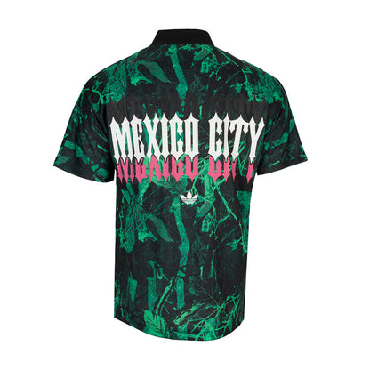 Men's graphic jersey back, black with green abstract pattern and pink 'MEXICO CITY' lettering