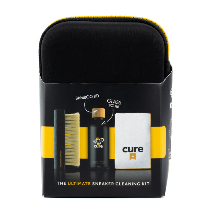 Sneaker cleaning kit box showing black brush, bamboo brush, and white-yellow cloth