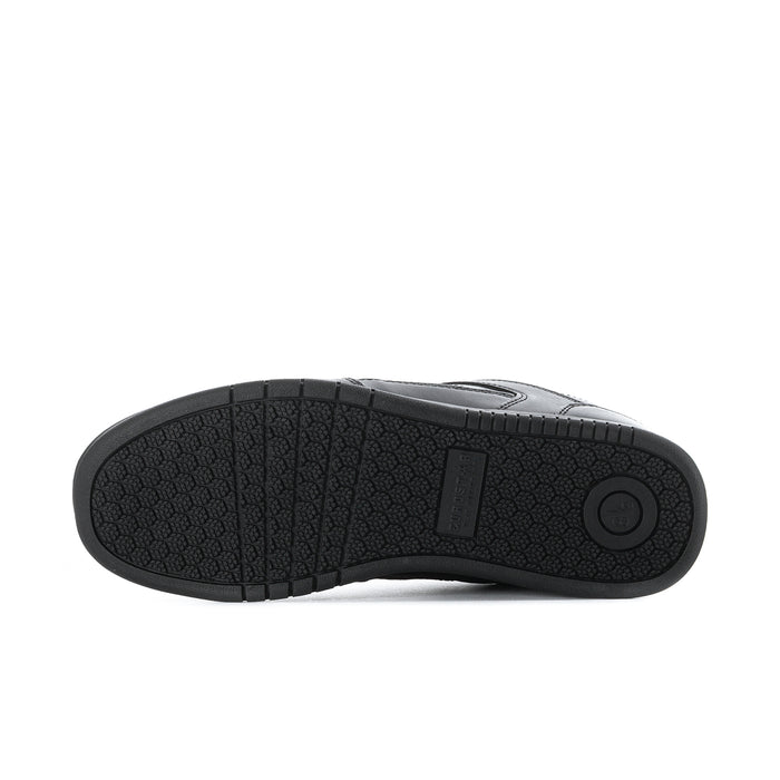 Men's black sneaker outsole tread, circular logo detail on rubber sole