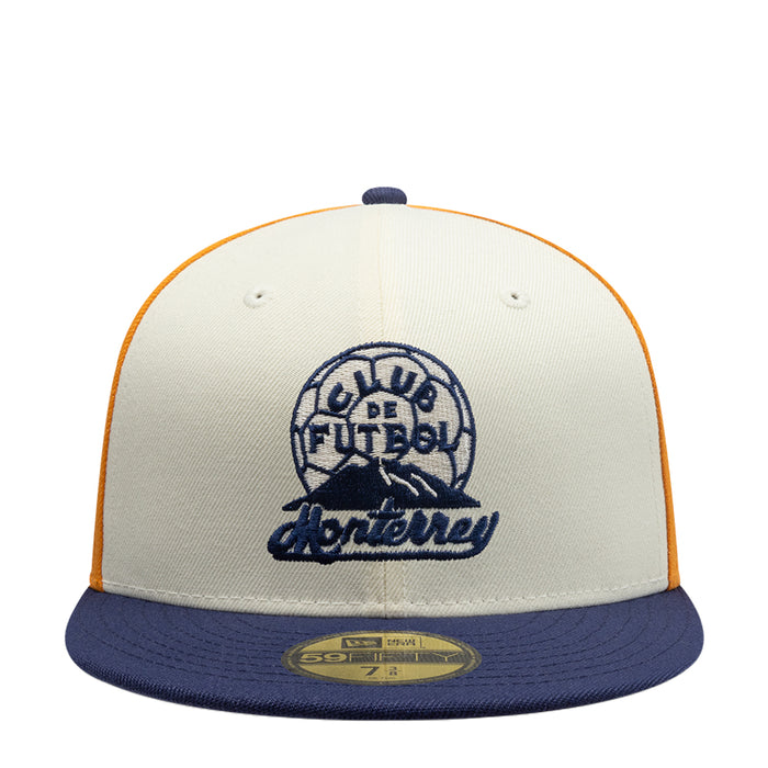 Three-tone baseball cap in white, gold, and navy with embroidered front logo
