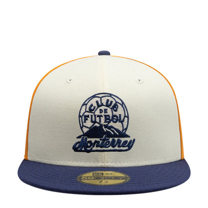 Three-tone baseball cap in white, gold, and navy with embroidered front logo