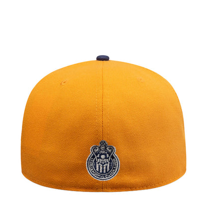 Three-tone baseball cap in orange with navy embroidered side crest