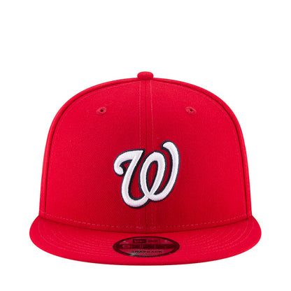 Red baseball cap with embroidered W logo, curved brim