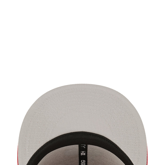 Light gray/white baseball cap with black underside and small side mark