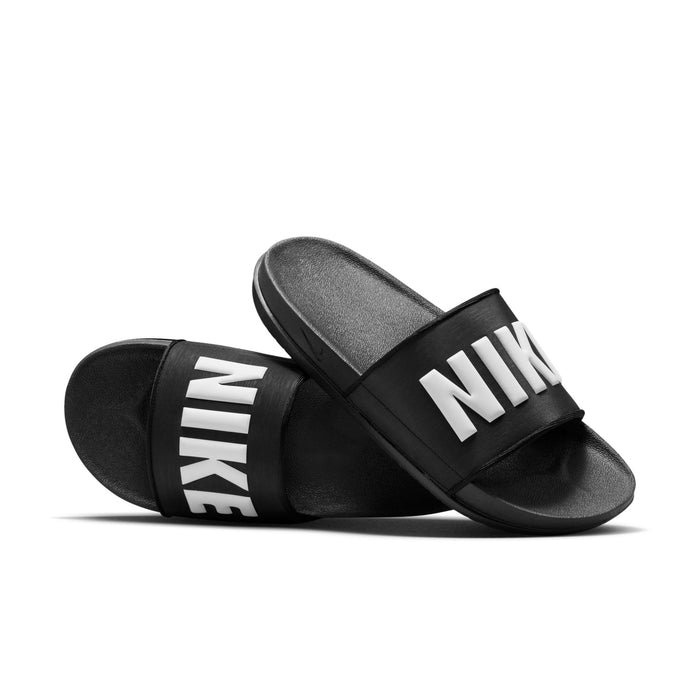 Men's black slide sandals, side view with wide Nike band