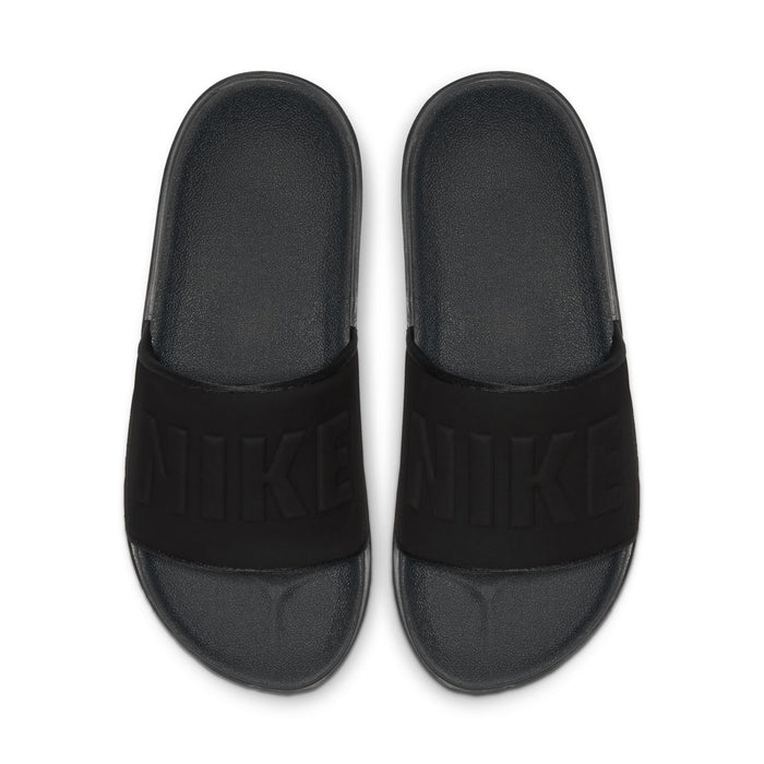 Women's black slide sandals with wide strap and embossed NIKE logo
