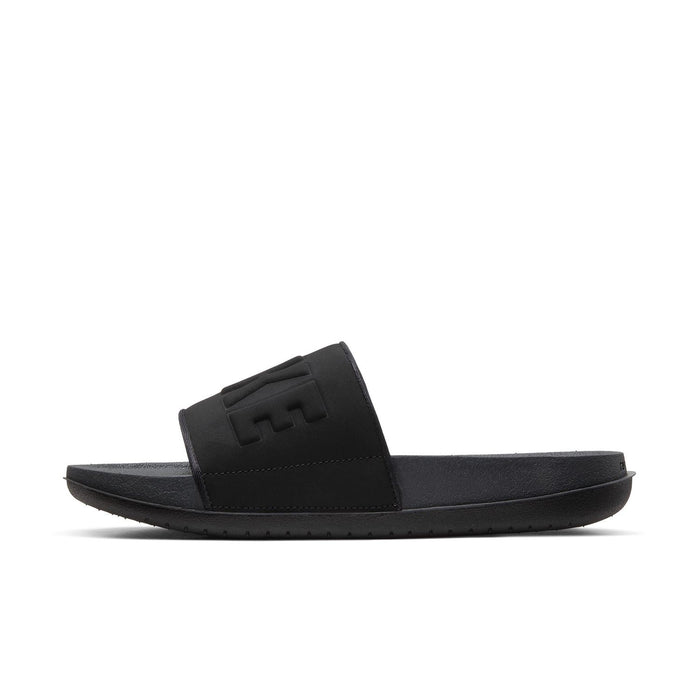 Women's black slide sandal with wide strap and embossed NIKE logo
