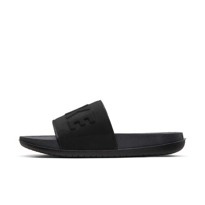 Women's black slide sandal with wide strap and embossed NIKE logo