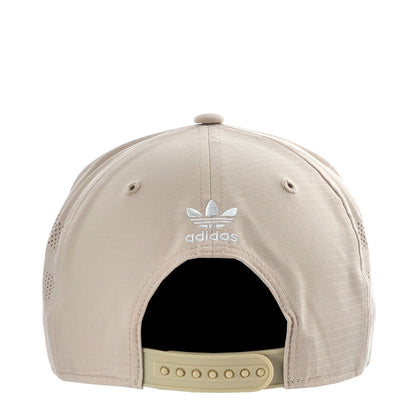 Light beige snapback cap with adidas logo and adjustable eyelet strap.