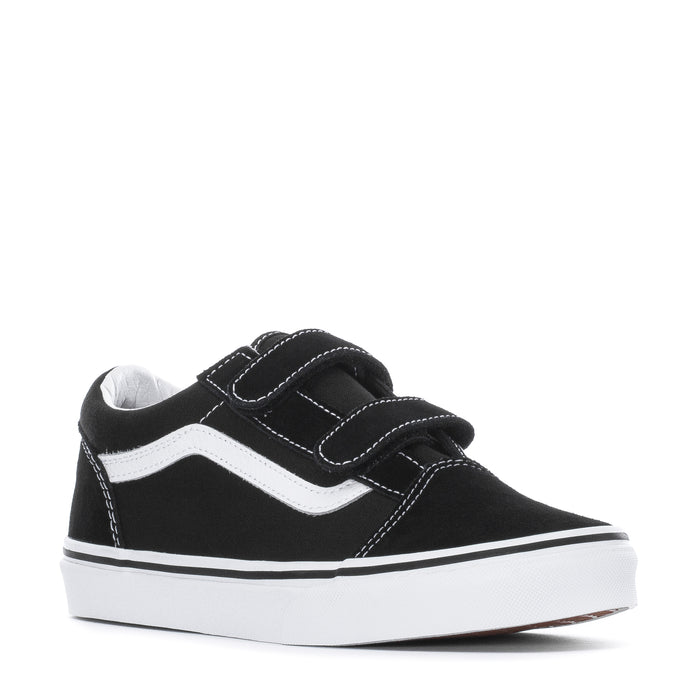 Youth black skate shoe with Velcro closure, white stripe detail, low profile sole