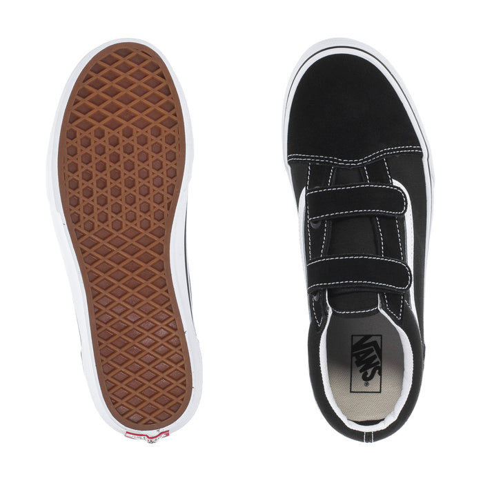 Youth skate shoe outsole and inner lining, black upper with white sole and label